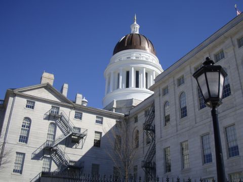 Maine State House dome against a clear blue sky by IBEW 1837